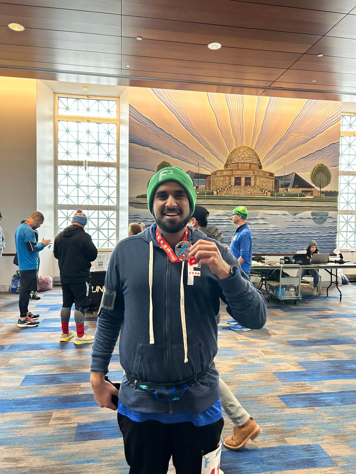 Posing with the medal